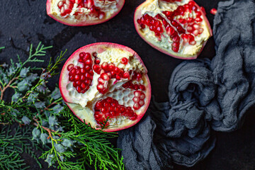 pomegranate sweet ripe red fruit on the table new year treat christmas serving portion size top view place copy space for text