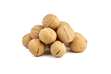 Whole walnuts heap isolated on white background