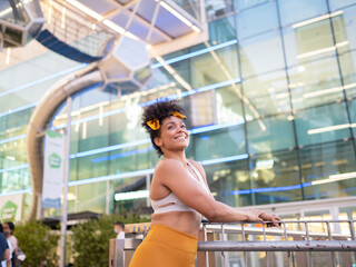 young afro girl with strong and happy sportswear