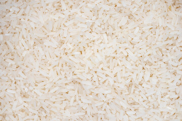 long grain rice pattern. top view jasmin rice background and texture.