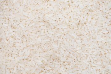 long grain rice pattern. top view jasmin rice background and texture.
