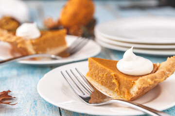 Pumpkin Pie Slices with Whipped Cream Garnish
