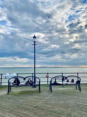 Sea, pier and moody skies 
Southend on Sea in it's beauty 
Adventure Island in the dark 