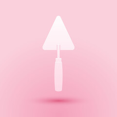Paper cut Trowel icon isolated on pink background. Paper art style. Vector.