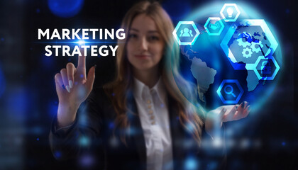 Business, Technology, Internet and network concept. Young businessman working on a virtual screen of the future and sees the inscription: Marketing strategy