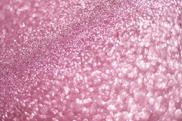 Sparkling bokeh background in a fresh pink color. pink sequins background defocus
