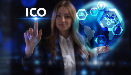 Business, Technology, Internet and network concept. Young businessman working on a virtual screen of the future and sees the inscription: ICO