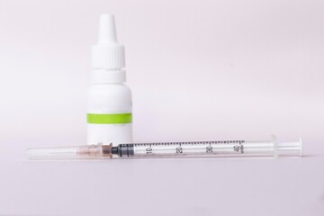 Vaccine vial and syringe, vaccination  and immunity improvement concept.  