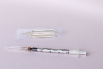 Vaccine vial and syringe, vaccination  and immunity improvement concept.  