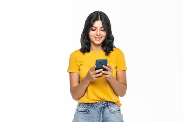 Portrait of happy smiling woman typing sms on smartphone isolated on white background