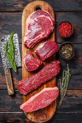 Raw prime black angus beef steaks fillet Mignon, rib eye or cowboy, Striploin or new york, skirt or...
