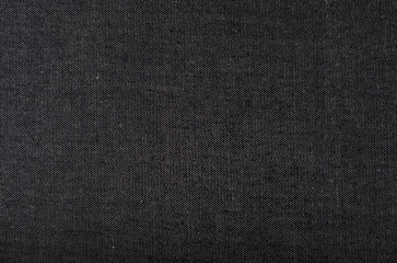 Background from black denim. Fabric texture.
