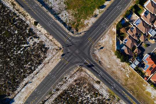 Aerial view of a crossroads with houses around in Parow, Cape Town, South Africa