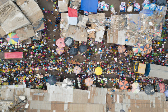 Aerial view of people at a community market in Waterloo, Sierra Leone