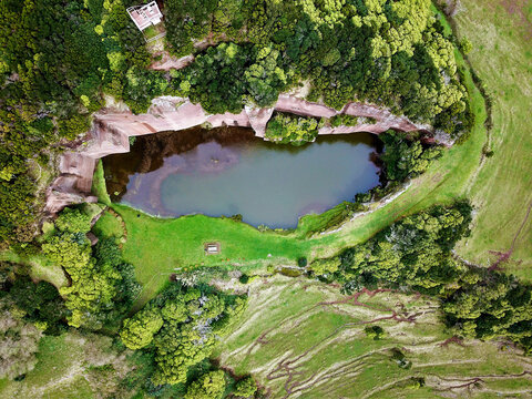Aerial view of Po√ßo da Pedreira, an old quarry transformed into a pond on the island of Santa Maria, Azores, Portugal.