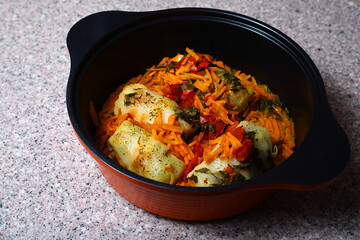 Frying pan with stew wrapped in cabbage. Stuffed cabbage. Vegetables. Healthy food.