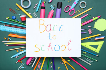 Different school supplies with text Back to School on green background