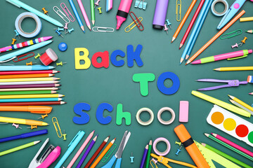 Different school supplies with text Back to School on chalkboard background