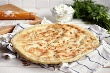 National traditional Caucasian food: Ossetian pies, khachapuri, chudu