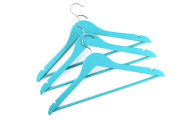 Blue wooden hangers isolated on white background