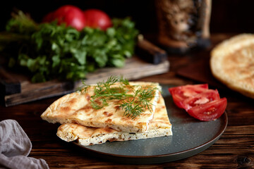National traditional Caucasian food: Ossetian pies, khachapuri, chudu
