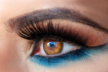 Obraz premium close up of female eye with makeup