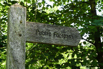 public footpath old wooden signpost
