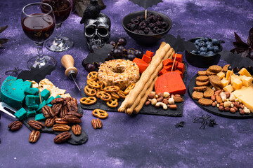 Halloween cheeseboard with blue and red cheese