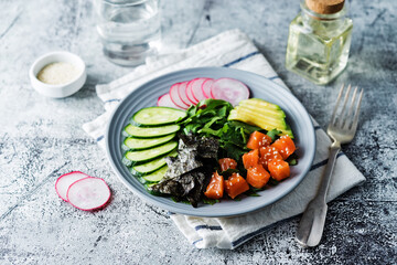 Salmon cucumber avocado Poke bowl