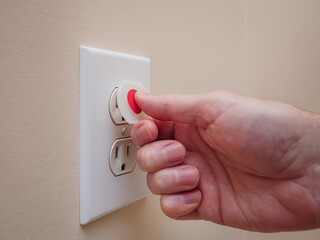 Electrical outlet with electricity safety cover to prevent child electrocution. Baby proofing...