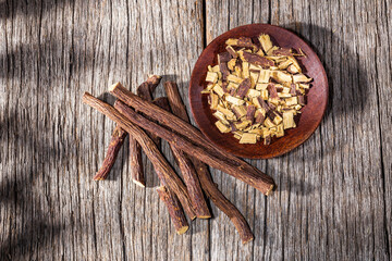 licorice root, on the wooden table