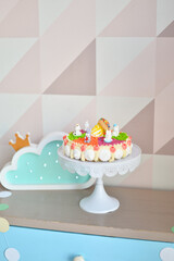 Birthday party decoration with balloons and cakes