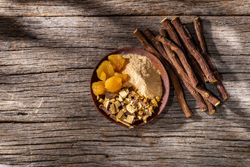 licorice powder and resin, on the table