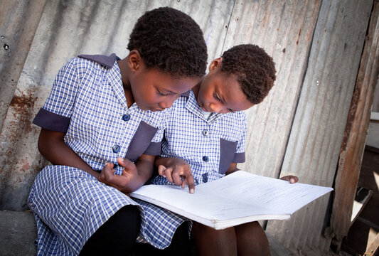 African Kids doing Homework