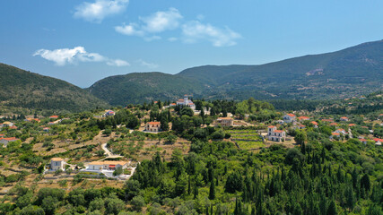 Aerial photo taken by drone of Caribbean tropical exotic steep cliff island bay with turquoise clear sea sandy beaches and rare limestone trees