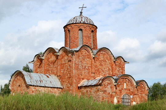 Beautiful medieval church of the Savior on Kovalevo with red walls near Velikiy (Great) Novgorod, Russia