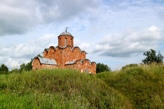Beautiful medieval church of the Savior on Kovalevo with red walls near Velikiy (Great) Novgorod, Russia