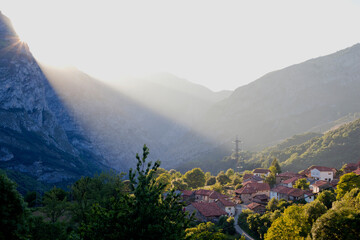 Mountain village highlighted by the afternoon sun