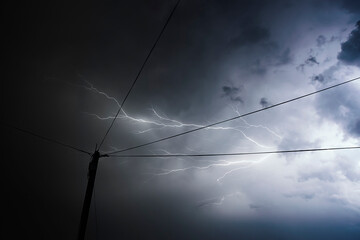 Lightning over the city | thunder storm in massive blue cloud | stormy weather | electricity |...