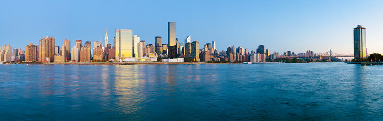 Skyline of Midtown Manhattan seen from the East River showing the Chrysler Building and the United Nations building, New York, United States of America