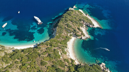 Aerial drone photo of beautiful paradise steep cliff sandy beach of Gidaki accessible by short hiking in beautiful Ionian island of Ithaki or Ithaca, Greece