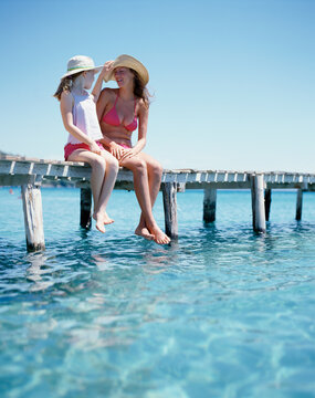 Mother and Daughter spending time together by the sea.