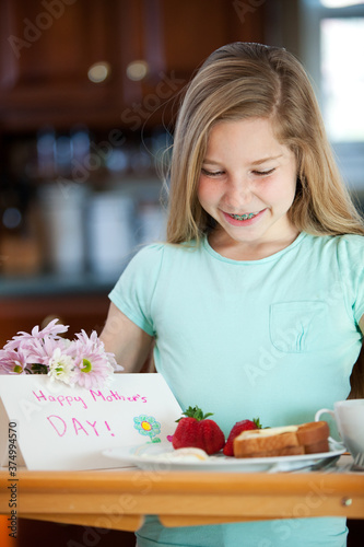 Mother's Day: Daughter Bringing Mother Breakfast on Mother's Day