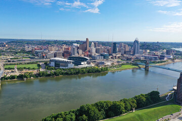 Fototapeta na wymiar Aerial photo of blue skies over Cincinnati, the Ohio River, Covington Kentucky and Newport.