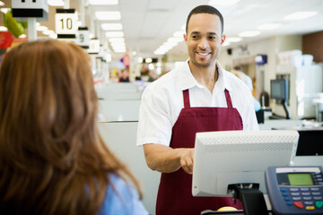 Supermarket: Cheerful Cashier in Supermarket