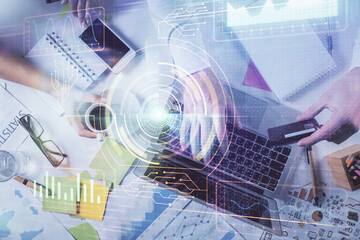 Double exposure of man's hands typing over computer keyboard and data theme hologram drawing. Top view. Technology concept.