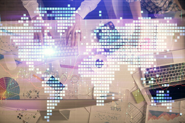 Double exposure of man and woman working together and business theme hologram drawing. Computer background. Top View.