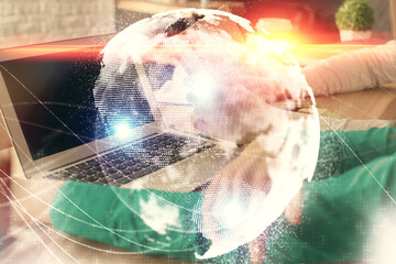 Double exposure of man and woman working together and financial theme hologram. international business concept. Computer background.