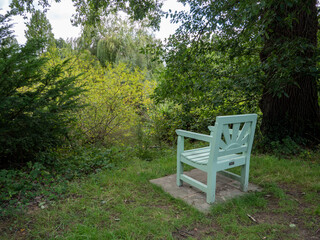 wooden blue chair in the park