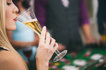 Casino: High Roller Takes Sip Of Champagne In Casino